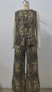 Two-piece leopard print denim set featuring a sleeveless vest and wide-leg trousers
