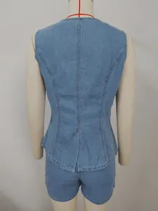 Back view detail of washed blue denim sleeveless vest and shorts set for women