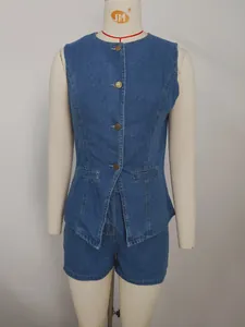 Detailed view of blue washed denim sleeveless vest and shorts set on mannequin