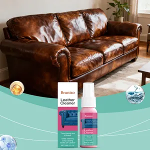 Spray detergente per pelle Brunizo 30ml e confezione mostrati su divano in pelle marrone lucida