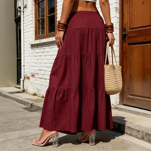Detailed back view of maroon tiered bohemian maxi skirt showing the flowing fabric texture