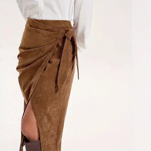 Elegant brown faux suede wrap skirt for women featuring a stylish side tie-knot detail