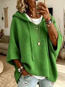 Casual women's green hooded knit sweater featuring drawstring detail and relaxed fit.