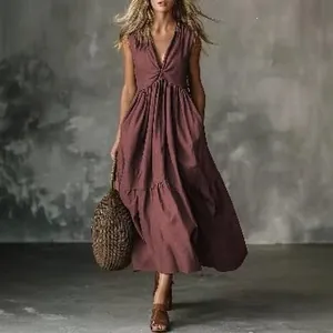 Elegant sleeveless V-neck solid color maxi dress in dusty rose for a boho summer look.