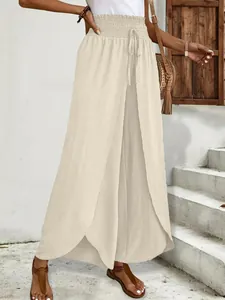 Elegant beige high-waist wide-leg pants featuring a stylish front split design for women