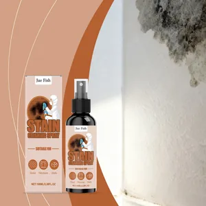 Flacon et boîte de spray nettoyant Jue Fish présentés devant un fond de mur sale