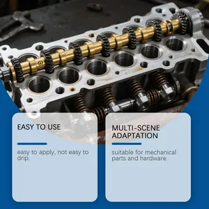 Close-up of engine camshafts showing maintenance with multi-purpose lithium grease.