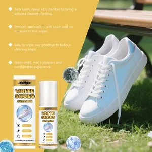 Detailed view of Jakehoe white shoes cleaner foam features and sneakers on fresh grass