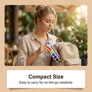 Portable compact heart-shaped watercolor paint set stored in a backpack for travel use