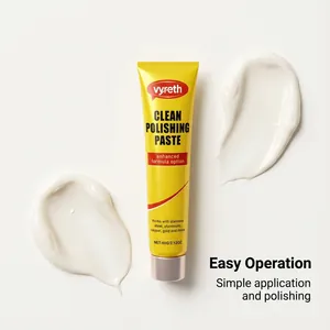 Macro view of white polishing paste texture and a yellow metal cleaning squeeze tube.