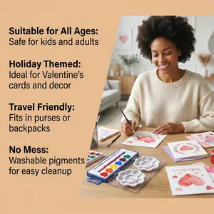 Woman using heart-shaped watercolor paint set for Valentine's cards and DIY decor