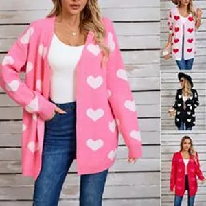 Collage of women's oversized heart print cardigans in pink, white, black, and red.