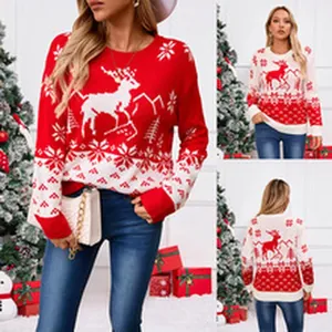 Details of women's Christmas knit sweater featuring festive reindeer and snowflake print.