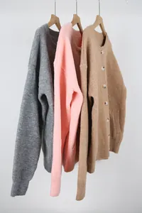 Soft knit cardigans in multiple colors with round neck and functional buttons