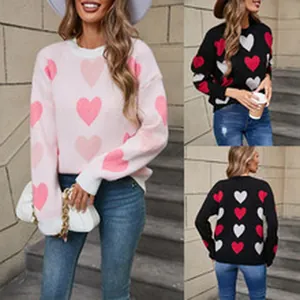Women's casual knit sweater featuring all-over heart print in pink and black variants.