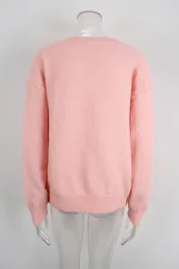 Back view detail of soft pink knit sweater on transparent mannequin for women