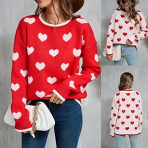 Detailed views of stylish women's heart print knit sweater in red and white color options.
