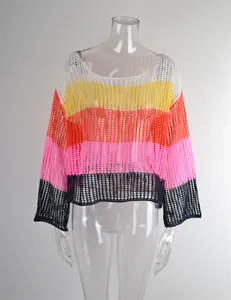 Detailed view of hollow-out rainbow striped crochet cover-up with long sleeves
