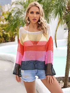 Detailed macro view of colorful hollow-out knit cover-up for beach vacation outfits