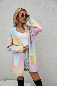 Full view of long-length loose rainbow tie-dye cardigan sweater with side pockets