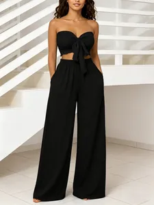 Elegante conjunto de dos piezas negro para mujer con top palabra de honor y pantalón ancho