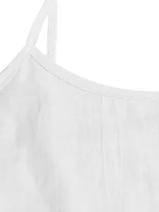 Detailed macro shot of white linen blend summer camisole dress showing strap and stitching