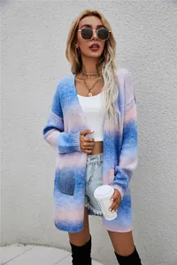 Detailed view of women's oversized ombre knit cardigan with rainbow tie-dye pattern