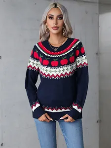Suéter de punto azul marino con motivos de manzanas rojas y detalles geométricos festivos.