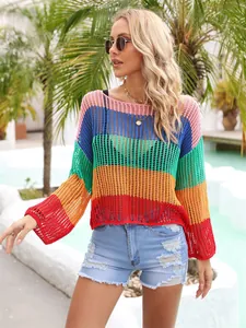 Detailed shot of a colorful rainbow crochet knit sweater for summer beach holidays