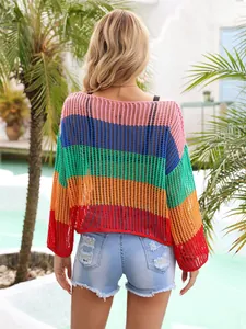 Back view of a colorful rainbow striped crochet knit cover-up for beach vacations.