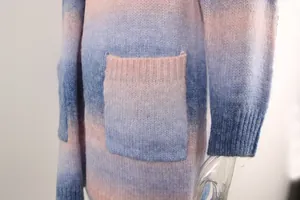 Close-up of a soft rainbow tie-dye knitted cardigan showing the pocket detail and texture