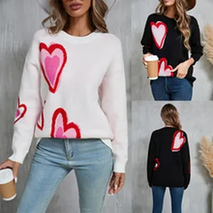 Detail collage showing white and black women's long sleeve heart print knit sweaters