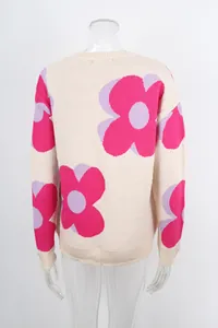 Back view of a beige knit sweater featuring bold pink and purple flower prints.