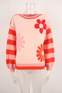 Front detail of pink and red floral knit sweater with striped sleeves on mannequin
