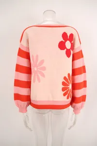 Back view of pink floral sweater with red striped sleeves and crew neck design