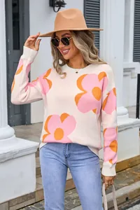 Stylish women's crew neck knit sweater featuring large pink and orange floral patterns