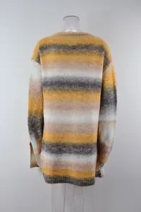 Back view of oversized rainbow gradient knit sweater showing texture and horizontal stripes.