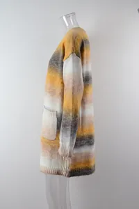 Side view detail of a rainbow ombre knit cardigan with loose fit and large side pocket