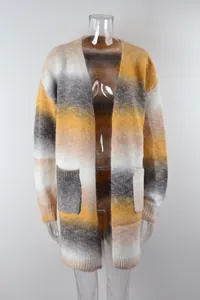 Detail shot of a women's mid-length rainbow gradient knit cardigan with front pockets.