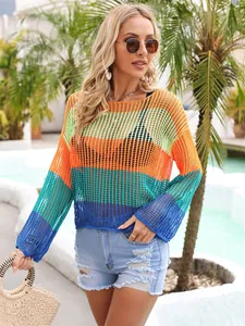 Detail of a colorful rainbow striped hollow-out knit cover-up for beach resorts.