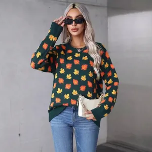 Stylish dark green crew neck knitted sweater with vibrant maple leaf pattern print