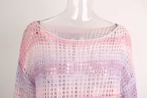 Close-up detail showing the intricate pink and purple gradient crochet mesh beach top