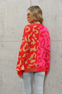 Oversize-Strickpullover mit Leopardenmuster in Rot und Rosa im modischen Patchwork-Design