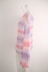 Side view detail of a pink and purple gradient hollow out crochet beach cover-up top