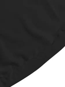 Close-up of black synthetic fabric texture showing detailed stitching for the summer skirt set.
