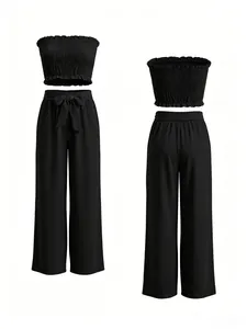 Elegante conjunto de dos piezas negro para mujer con top de nido de abeja y pantalón