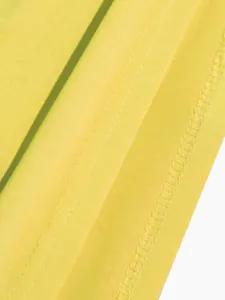 Macro detail of professional stitching and yellow fabric texture for summer skirt