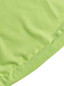 Detailed close-up shot of the lime green ribbed fabric texture with uniform stitching