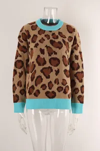 Casual leopard print knit sweater with blue ribbed crew neck and cuffs details.