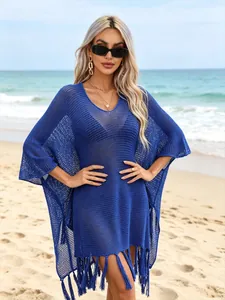Bohemian blue crochet beach cover-up with tassels and V-neck for summer resort wear